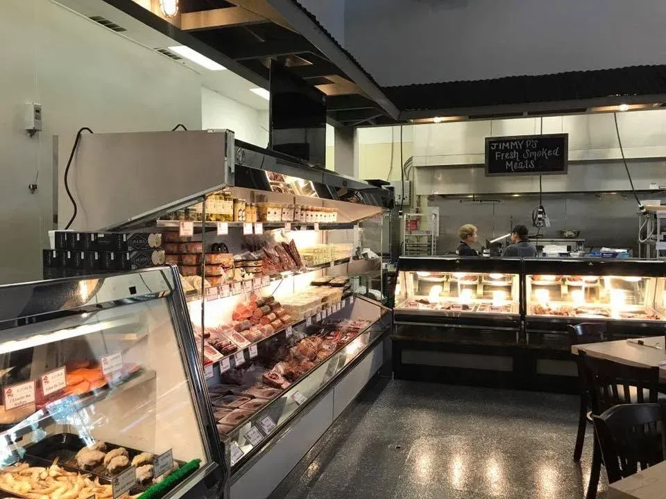 Inside Jimmy P's Bonita Springs butcher shop — cases filled with premium smoked meats